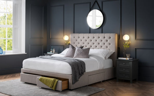 Modern bed frame with integrated storage drawers demonstrating key features to consider when choosing bedroom furniture