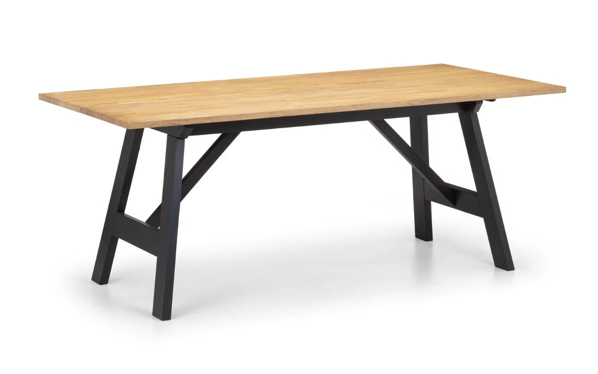 Wooden table with black metal legs on a white background