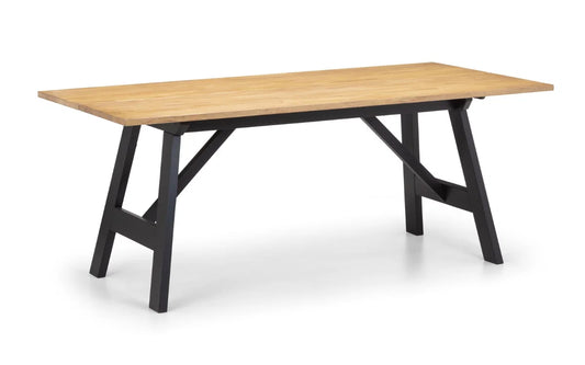 Wooden table with black metal legs on a white background