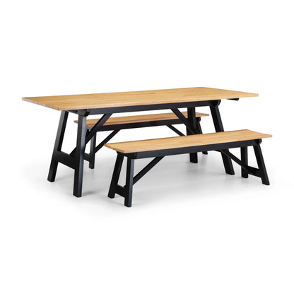 Wooden table with black legs and matching benches on a white background