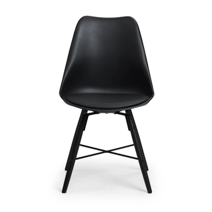 Black chair with wooden legs on a white background