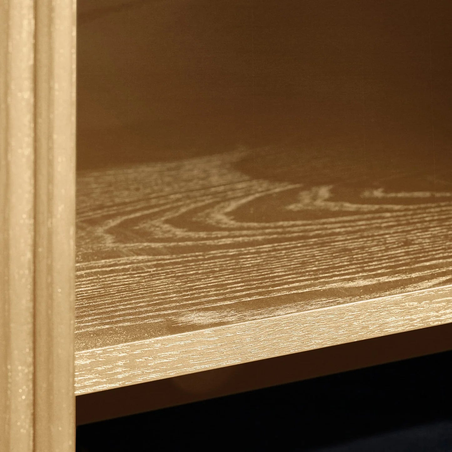 Close-up of a wooden surface with visible grain and texture.